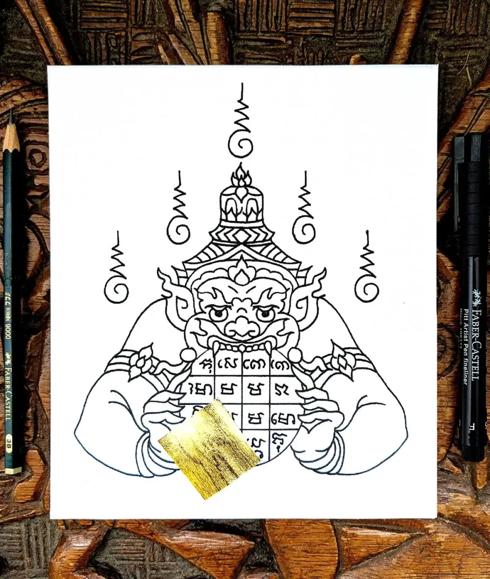 Dessin de Sak Yant Rahu, divinité des éclipses lunaire et solaire, tatouage thaïlandais avec feuille d'or
